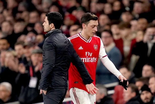 Mesut Ozil can play for Arsenal because of Thomas Partey protection – Paul Merson
