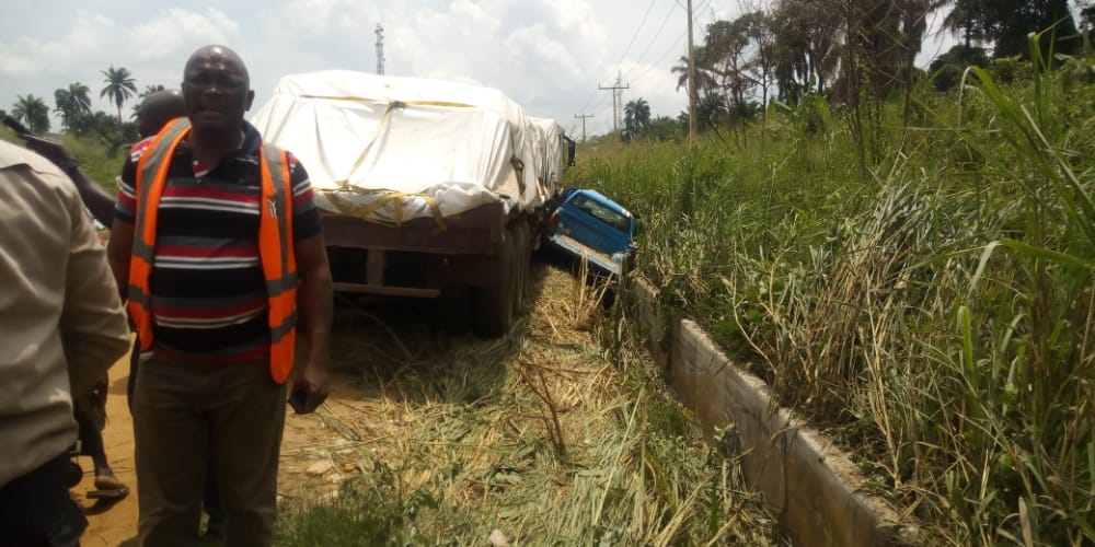 FRSC officials cheat death as trailer crushes official van in Osun.