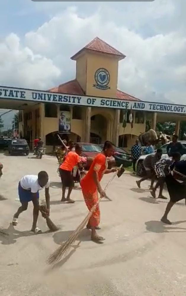 Delta Poly students celebrate exit of Rector by sweeping main gate