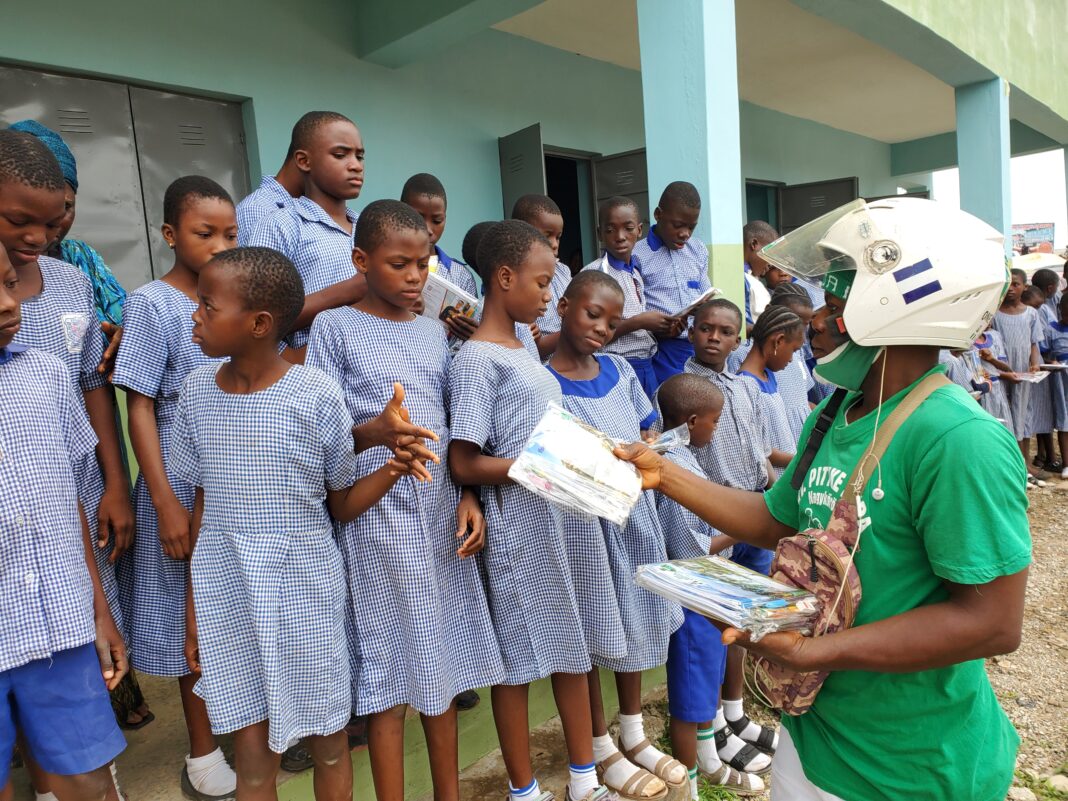 Bike Man Donates Writing Materials to Pupils in Ibadan