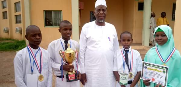 Sokoto SUBEB Presents 2022 Trophy To Yabo For Winning LGEA Basic Schools Debate Competition